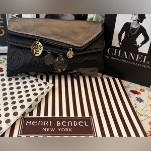 RARE HENRI BENDEL BLACK AND METALLIC BRONZE ZIP CLUTCH WITH 4 LOGO CHARMS ~ EUC!